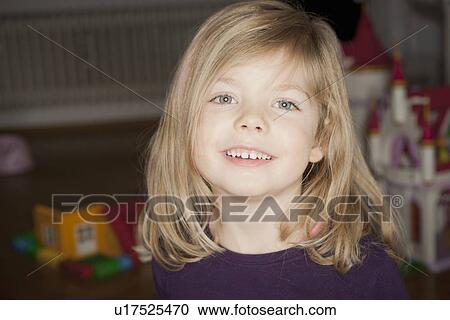 Close up of girls smiling face View Large Photo Image Stock Image - Close up of girls smiling face. Fotosearch