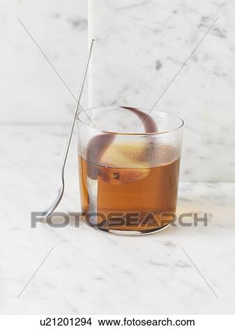 Picture - Close up of glass of apple punch. Fotosearch