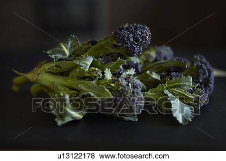Close up of greens on table View Large Photo Image Stock Photo - Close up of greens on table. Fotosearch