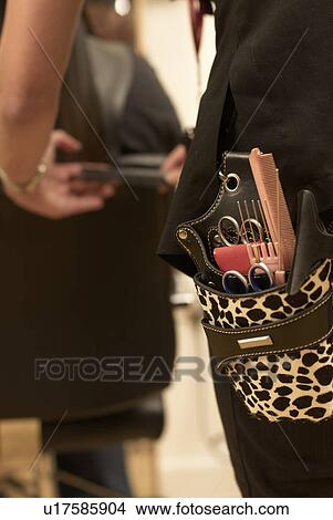 Close up of hair stylists tool belt View Large Photo Image Picture - Close up of hair stylists tool belt. Fotosearch