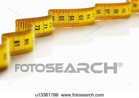 Close up of measuring tape View Large Photo Image Stock Photograph - Close up of measuring tape. Fotosearch