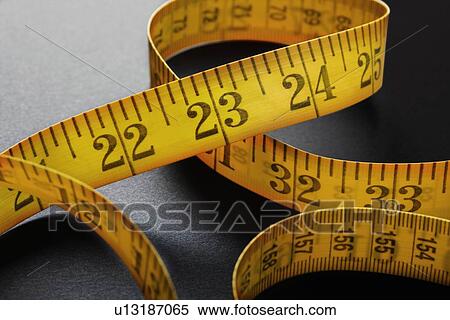 Close up of measuring tape View Large Photo Image Stock Photography - Close up of measuring tape. Fotosearch