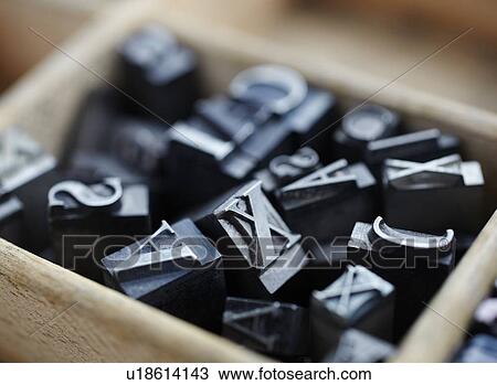 Stock Image - Close up of pile of lead type. Fotosearch