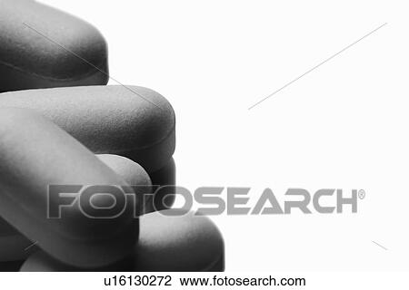 Stock Image - Close up of pills. Fotosearch
