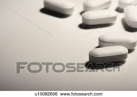Stock Photograph - Close up of pills. Fotosearch