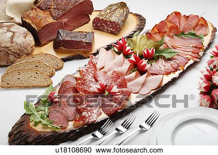 Close up of platter of meat and bread View Large Photo Image Stock Image - Close up of platter of meat and bread. Fotosearch