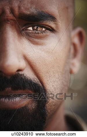 Stock Image - Close up of reflection in mans eye. Fotosearch