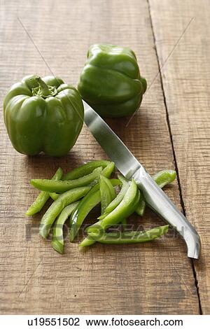 Stock Image - Close up of sliced green bell pepper. Fotosearch