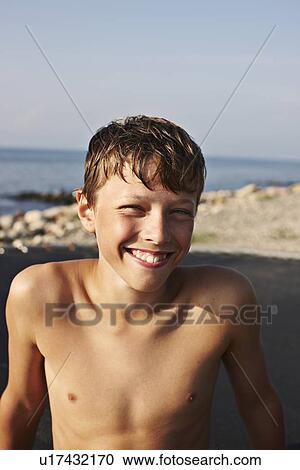 Close up of smiling boys face View Large Photo Image Stock Image - Close up of smiling boys face. Fotosearch