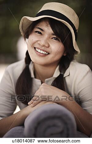 Close up of smiling girls face View Large Photo Image Stock Photo - Close up of smiling girls face. Fotosearch