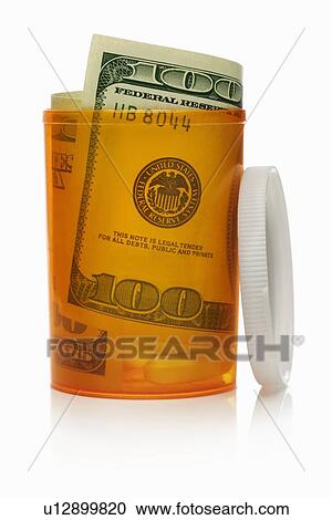 Close up of U. S. dollars in pill bottle View Large Photo Image Stock Image - Close up of U. S. dollars in pill bottle. Fotosearch