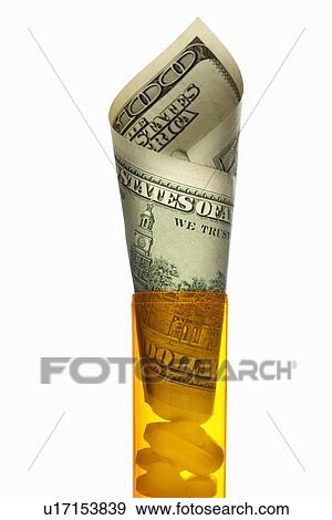 Close up of U. S. dollars in pill bottle View Large Photo Image Stock Photo - Close up of U. S. dollars in pill bottle. Fotosearch