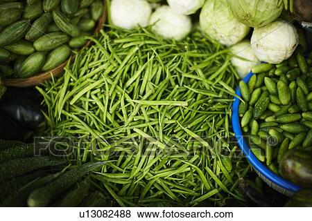 Stock Photo - Close up of vegetables for sale. Fotosearch
