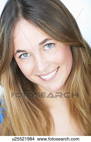 Close up of womans smiling face View Large Photo Image Picture - Close up of womans smiling face. Fotosearch