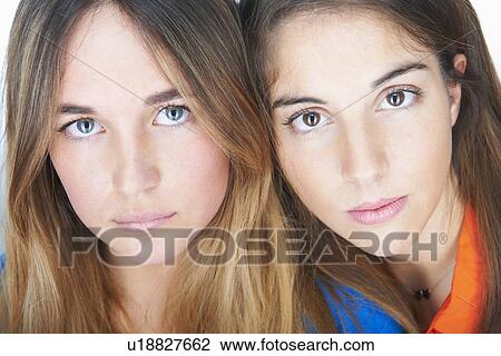 Close up of womens serious faces View Large Photo Image Stock Image - Close up of womens serious faces. Fotosearch