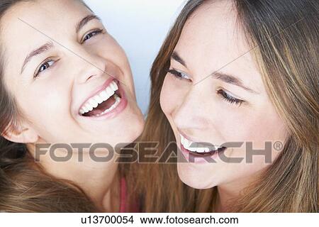 Close up of womens smiling faces View Large Photo Image Picture - Close up of womens smiling faces. Fotosearch