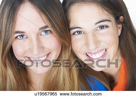 Close up of womens smiling faces View Large Photo Image Stock Photography - Close up of womens smiling faces. Fotosearch