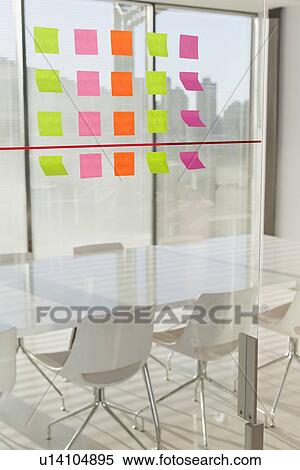 Colorful sticky notes on office window View Large Photo Image Stock Photography - Colorful sticky notes on office window. Fotosearch