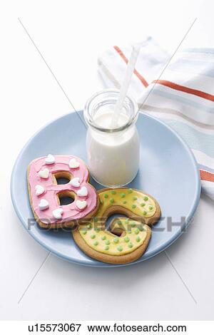 Stock Photo - Decorated cookies in letter shapes. Fotosearch