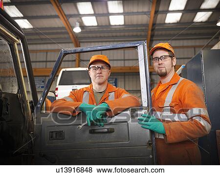 Engineer apprentices with truck View Large Photo Image Stock Photo - Engineer apprentices with truck. Fotosearch