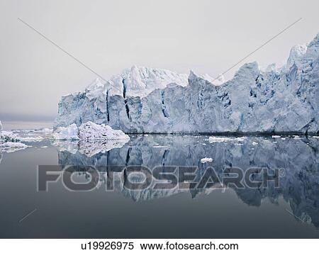 Glacier reflected in still lake View Large Photo Image Stock Photography - Glacier reflected in still lake. Fotosearch