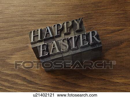 Stock Image - Lead type spelling "Happy Easter". Fotosearch