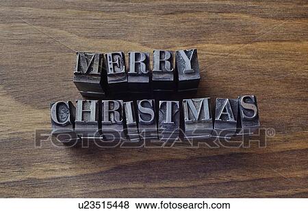 Stock Photo - Lead type spelling "Merry Christmas". Fotosearch
