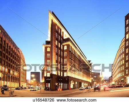 Stock Photograph - Lit buildings in Hamburg at night. Fotosearch