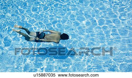 Man swimming in pool View Large Photo Image Stock Photography - Man swimming in pool. Fotosearch