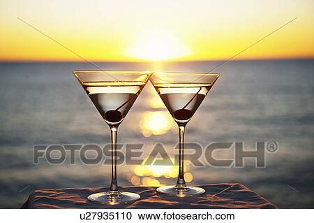 Martinis on table outdoors View Large Photo Image Stock Image - Martinis on table outdoors. Fotosearch