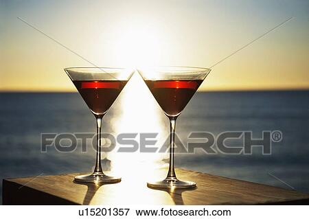 Martinis on table outdoors View Large Photo Image Stock Photo - Martinis on table outdoors. Fotosearch