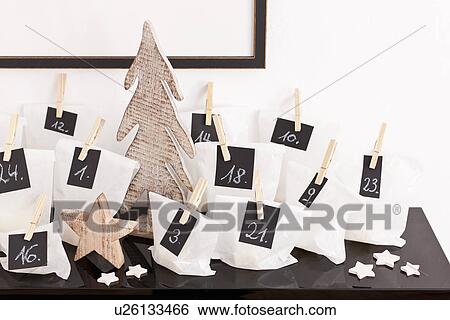 Stock Photograph - Numbered bags on desk. Fotosearch