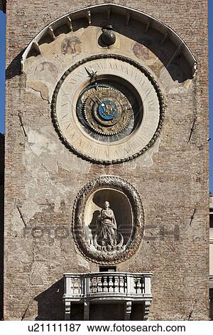 Ornate clock and statue on tower View Large Photo Image Stock Photo - Ornate clock and statue on tower. Fotosearch