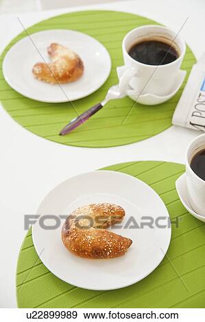Pastries and coffee on table View Large Photo Image Stock Photo - Pastries and coffee on table. Fotosearch