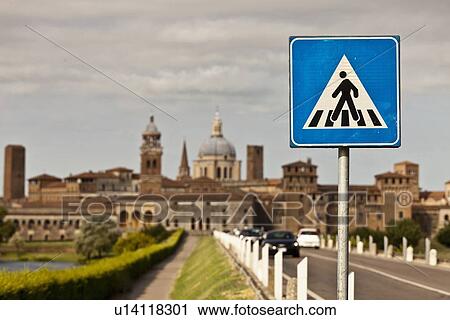 Stock Image - Pedestrian sign on rural road. Fotosearch