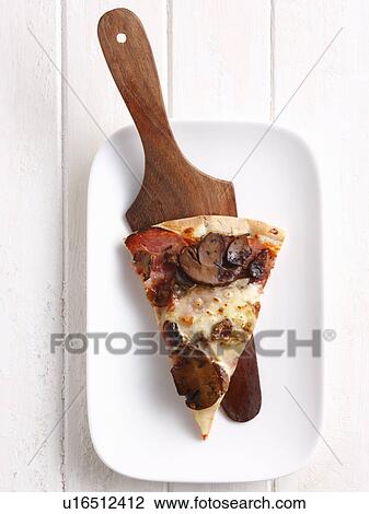 Slice of pizza on platter View Large Photo Image Stock Image - Slice of pizza on platter. Fotosearch