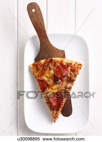 Slice of pizza on platter View Large Photo Image Stock Photography - Slice of pizza on platter. Fotosearch