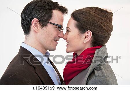 Smiling couple touching noses View Large Photo Image Stock Photo - Smiling couple touching noses. Fotosearch
