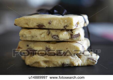 Stock Photo - Stack of shortbread tied with ribbon. Fotosearch