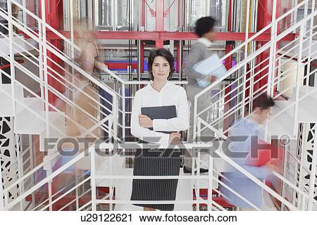 Time lapse of business people on stairs View Large Photo Image Stock Image - Time lapse of business people on stairs. Fotosearch