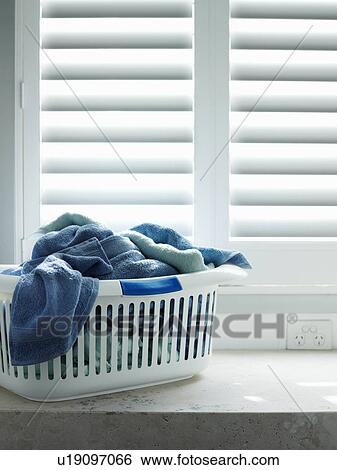 Towels in laundry basket View Large Photo Image Stock Photograph - Towels in laundry basket. Fotosearch
