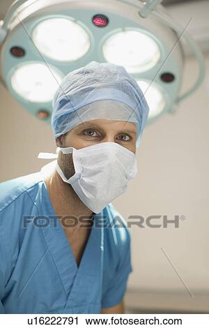 Veterinary surgeon wearing face mask View Large Photo Image Stock Image - Veterinary surgeon wearing face mask. Fotosearch