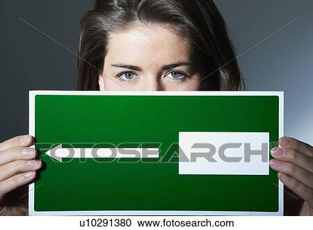 Woman holding sign with square View Large Photo Image Stock Image - Woman holding sign with square. Fotosearch