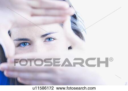 Woman making viewfinder with hands View Large Photo Image Stock Image - Woman making viewfinder with hands. Fotosearch