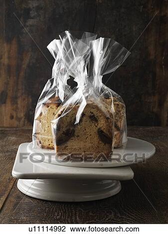 Stock Image - Breads in cellophane gift bags. Fotosearch