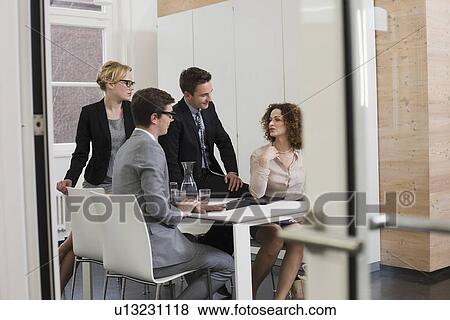 Business people playing board games View Large Photo Image Stock Photo - Business people playing board games. Fotosearch