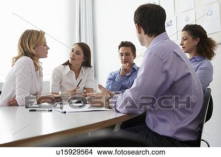 Business people talking in meeting View Large Photo Image Picture - Business people talking in meeting. Fotosearch