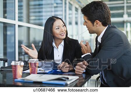 Business people using tablet computer View Large Photo Image Stock Photograph - Business people using tablet computer. Fotosearch
