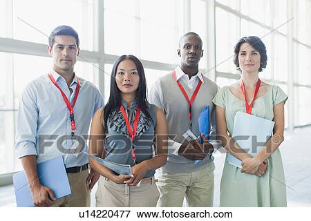 Business people wearing name tags View Large Photo Image Stock Photo - Business people wearing name tags. Fotosearch