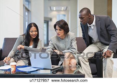 Business people working together View Large Photo Image Stock Photo - Business people working together. Fotosearch